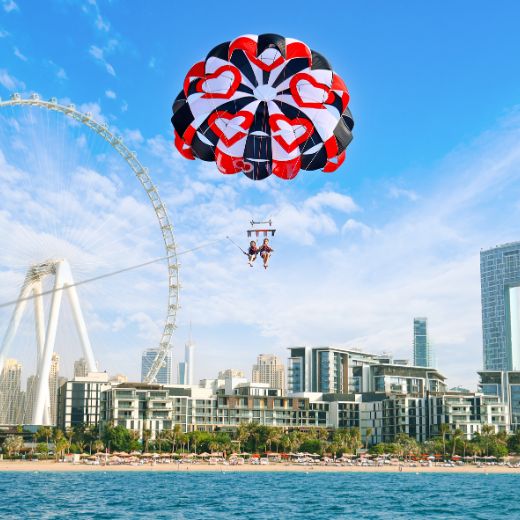 Red heart parasailing parachute activities near Jbr Dubai for Couples
